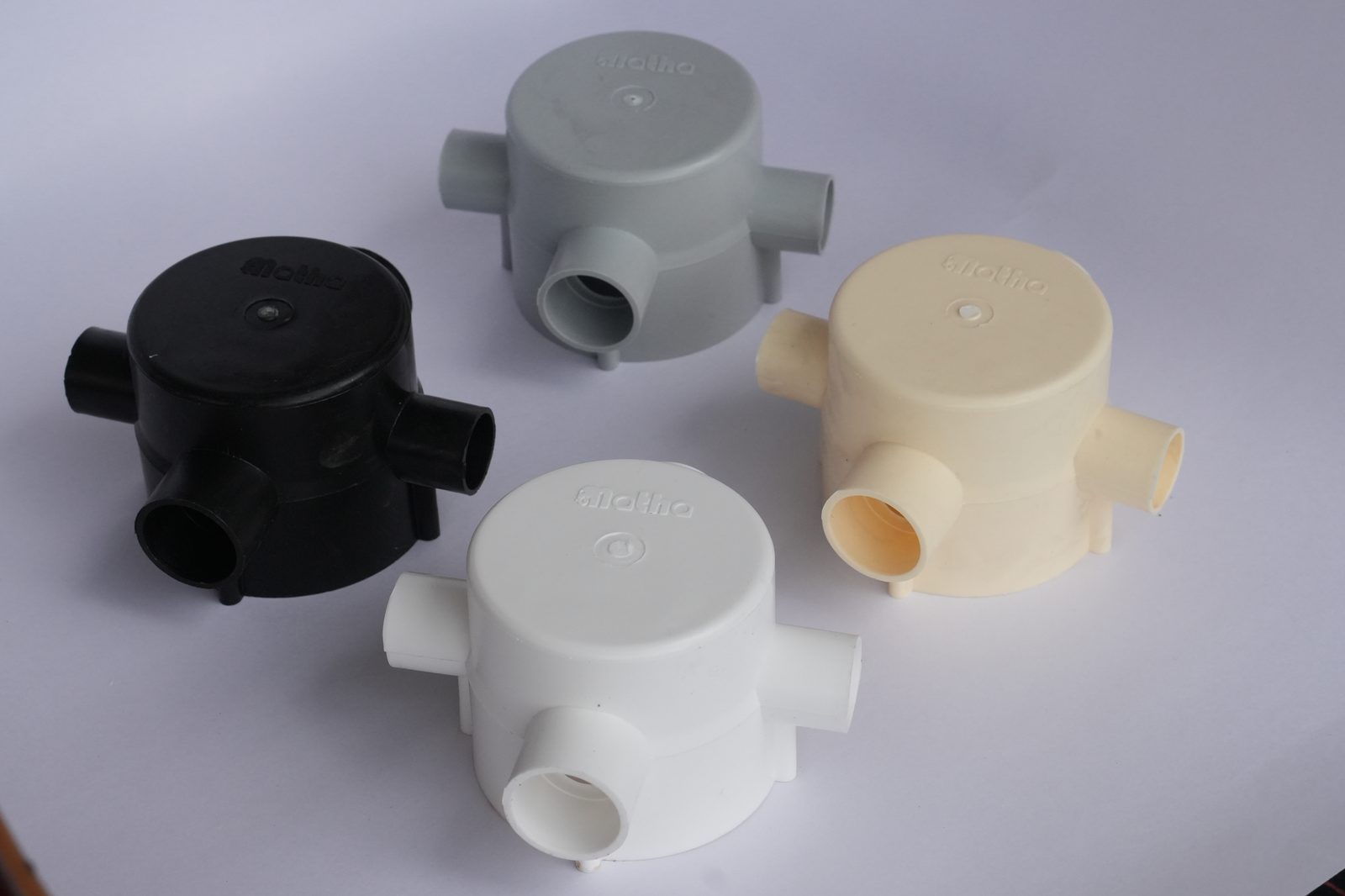 Matha PVC conduit junction box in black, grey, ivory and white