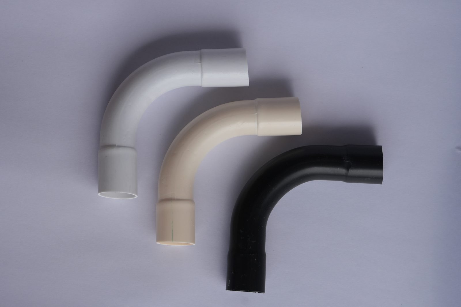Matha PVC long radius bend in white, ivory and black