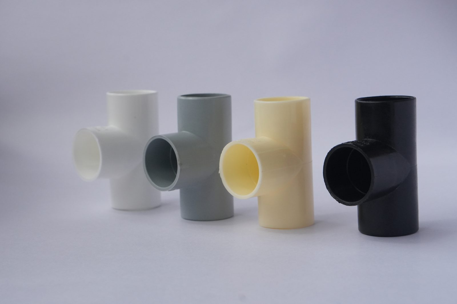 Matha PVC conduit tee fittings in white, grey, ivory and black